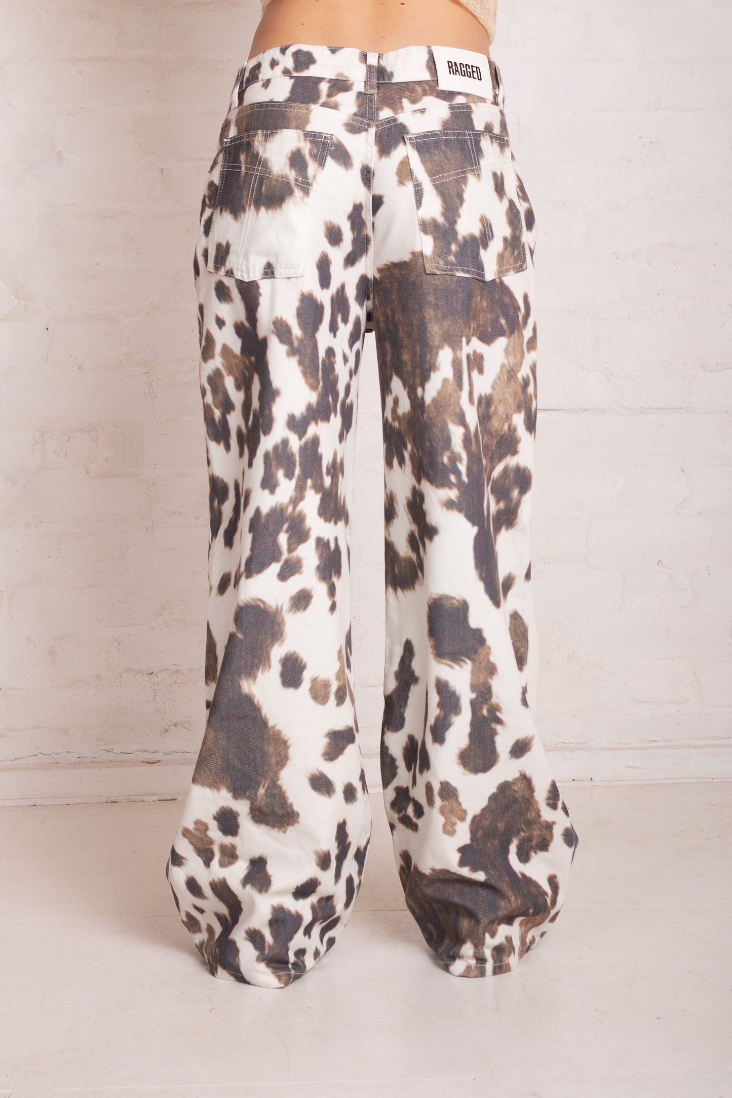 Pelt Cow Print Release Jeans