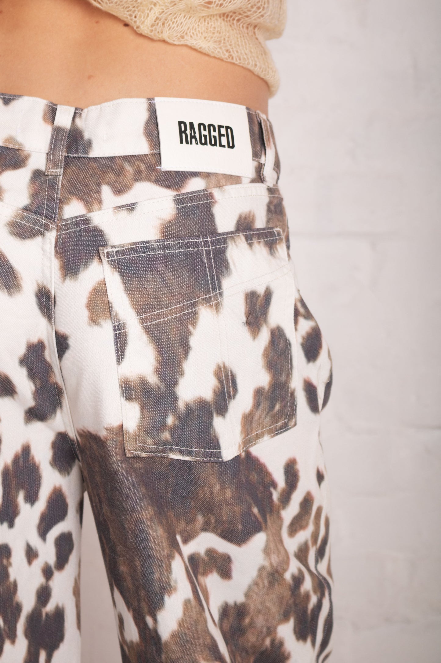 Pelt Cow Print Release Jeans