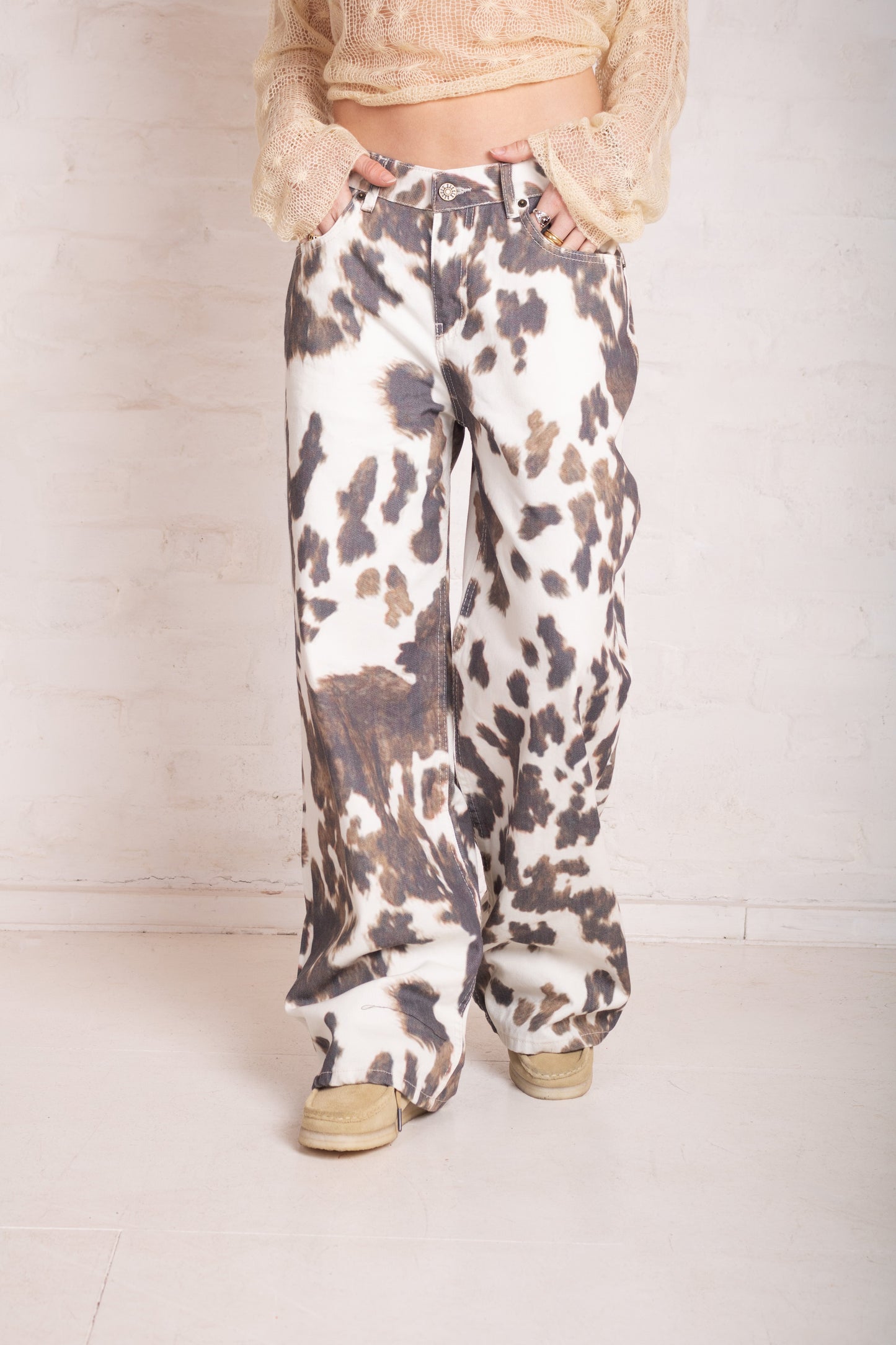 Pelt Cow Print Release Jeans